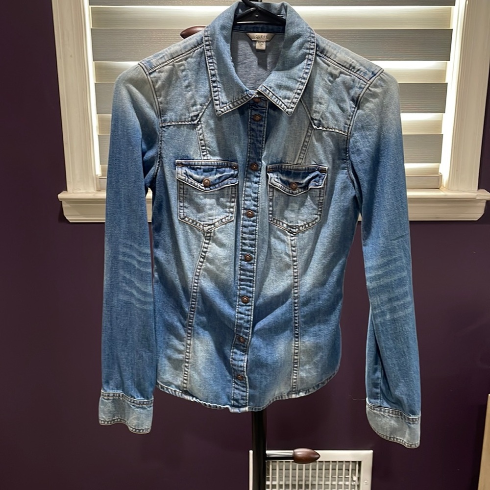 Guess woman’s button up Jean shirt.